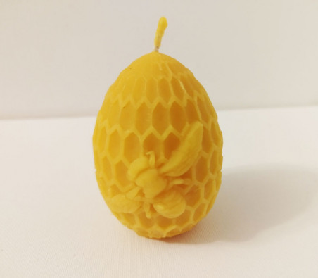 Bougie décorative en cire naturelle « Œuf en cire avec une abeille ».