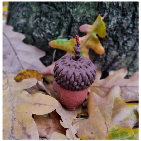 Beeswax candle in the shape of an acorn. Handmade.